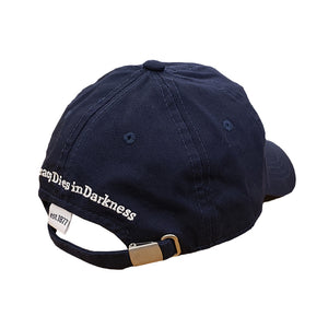 Back of navy baseball cap with "Democracy Dies in Darkness" in white lettering