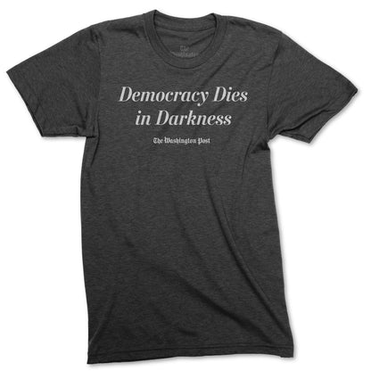 charcoal democracy dies in darkness t-shirt, short sleeved, white writing at the center of the top 